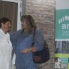 Ministra de Vivienda y Graciela en corte de cinta